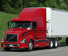 R&E Semi Driving on the Road